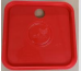 A red plastic tray with a hole in it for RentACoopUS Spare Parts for Buckets.